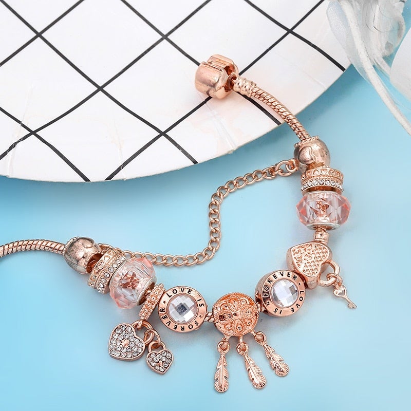 Claudine | Bracelet Attrape-Rêves Rose avec Charms Argentés