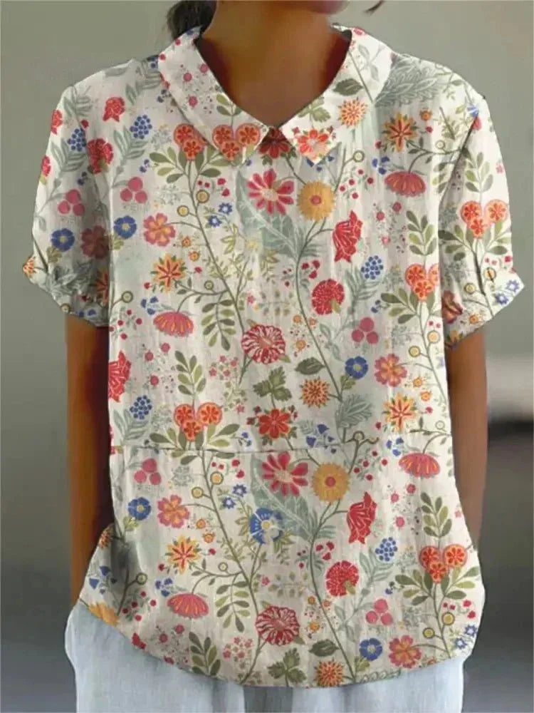 Sofia | Blouse Fleurie à Col Claudine et Poche