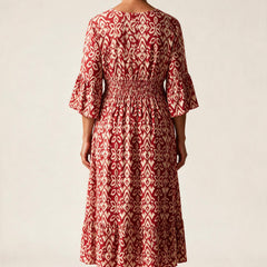 Robe midi Roseline vue de dos, encolure arrondie et bandeau smocké dans le dos