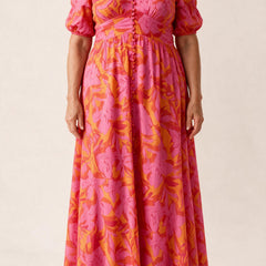 Robe longue Salomé — imprimé floral rose et orange, manches bouffantes et boutons recouverts, vue de face