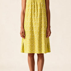 Robe Véronique à fines bretelles, coloris jaune à petites fleurs blanches, vue de face