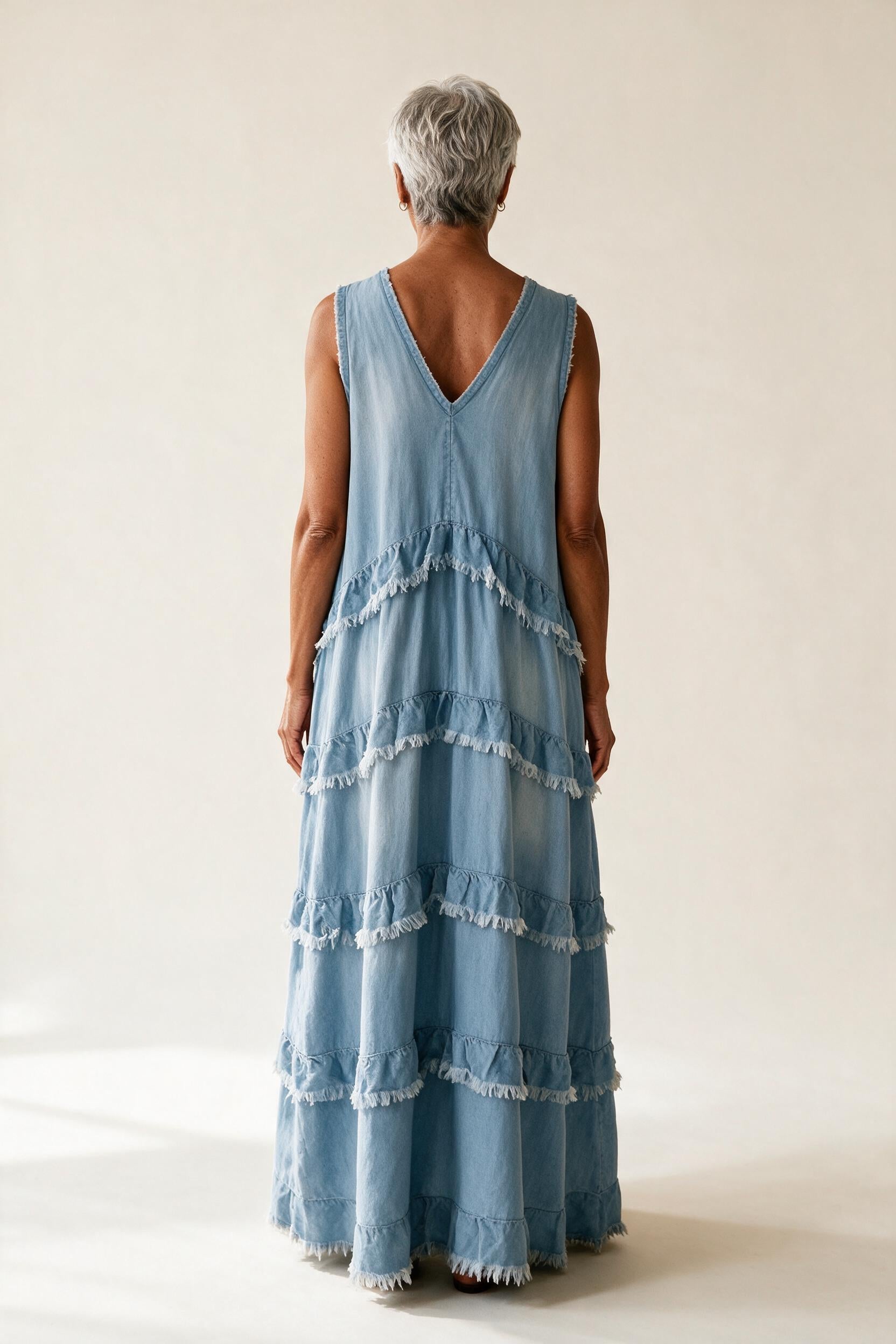 Robe Noémie vue de dos, volants superposés à franges