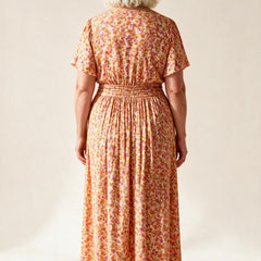 Robe Sidonie vue de dos, jupe plissée