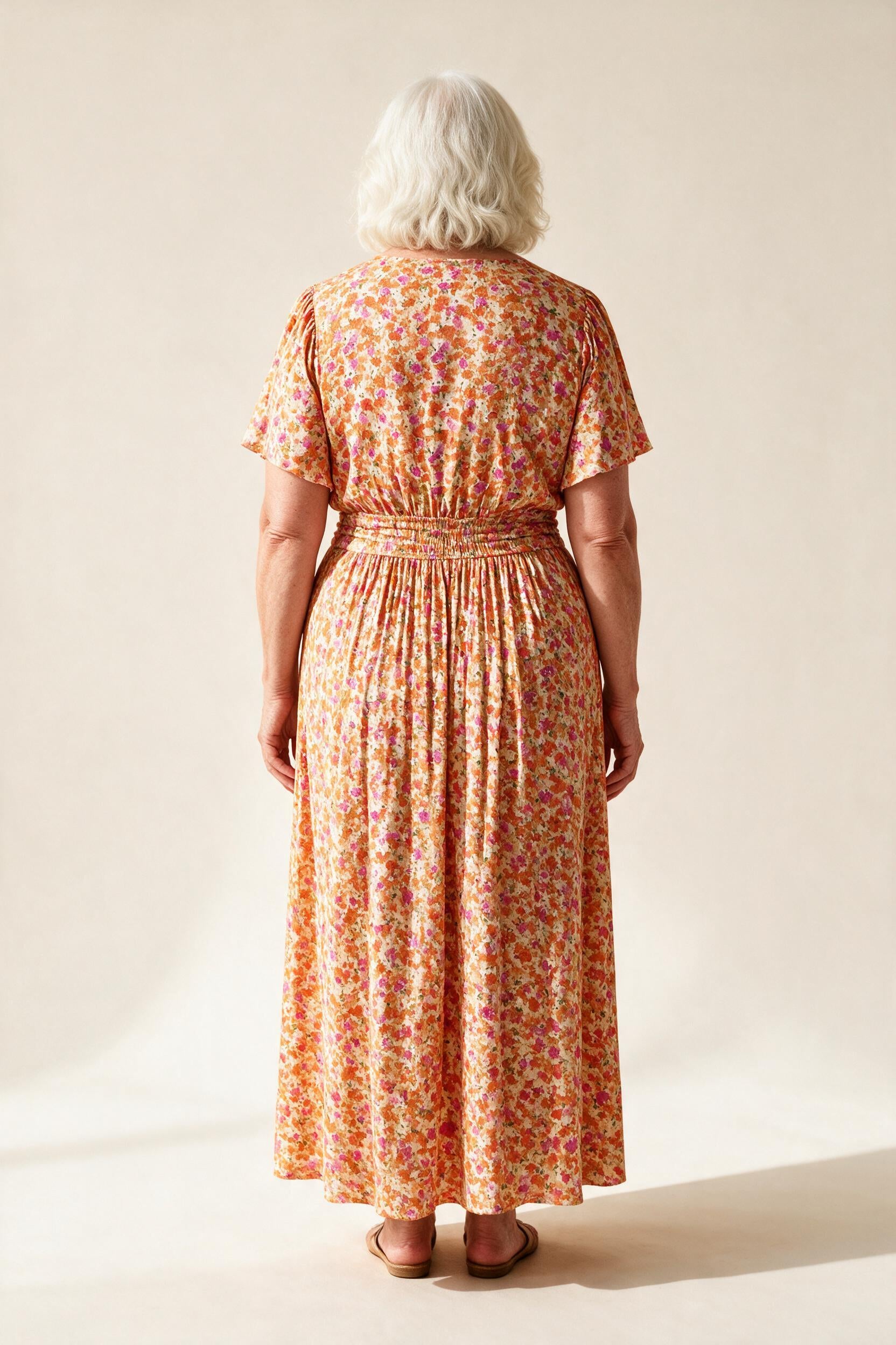 Robe Sidonie vue de dos, jupe plissée